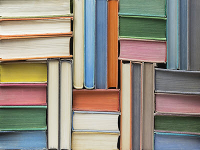 books stacked in various orientations