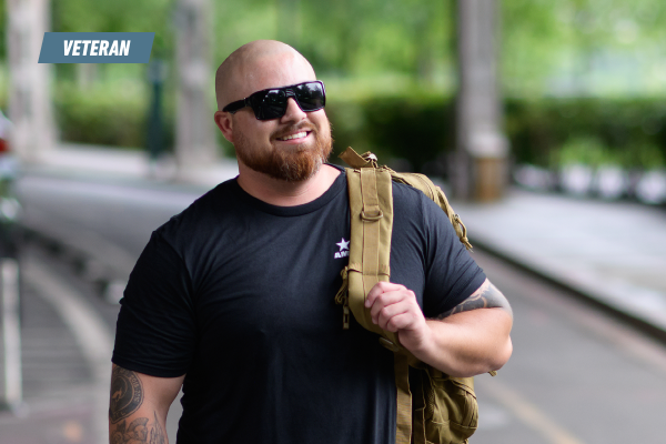 Brandon Villanueva walking down the street smiling