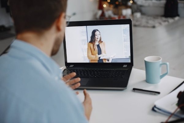 communications degree student on video conference call