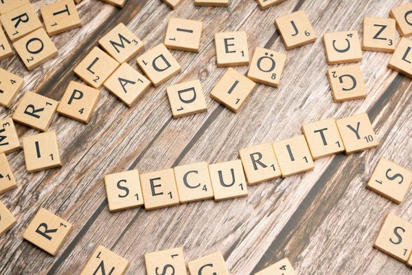 security spelled out in wooden word tiles