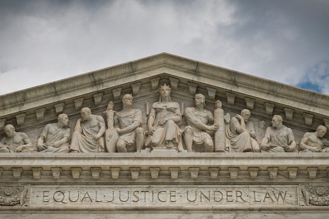 statues engraved on legal building