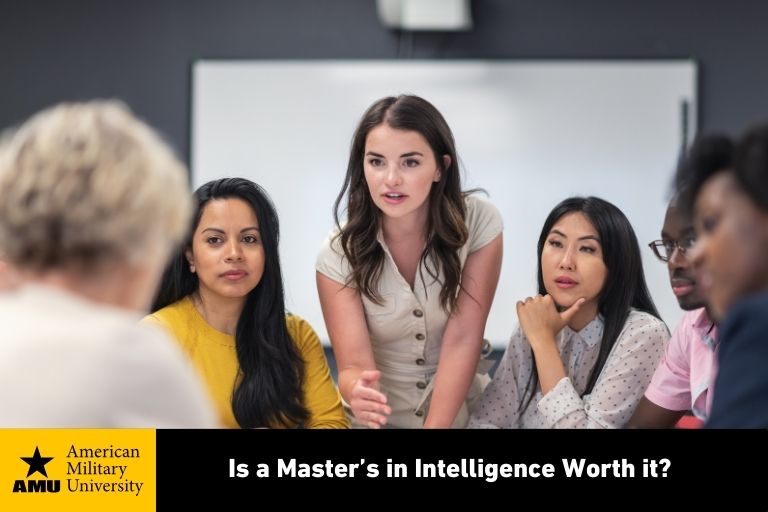 master's in intelligence graduate holding discussion in conference room