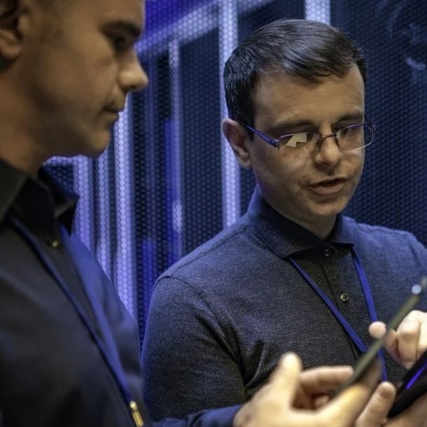 cybersecurity professionals discussing server