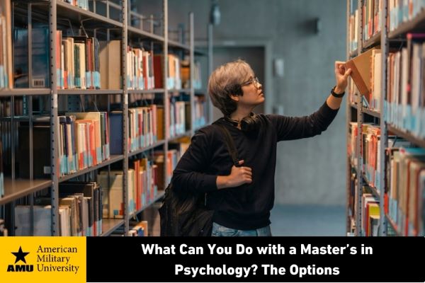 student looking at books on library shelf