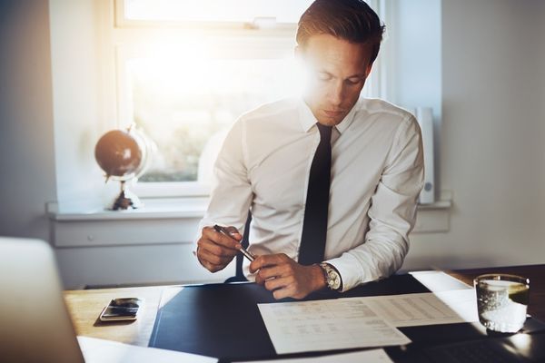 paralegal working at desk