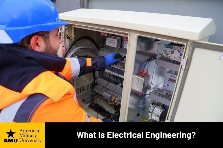 what-is-electrical-engineering electrical engineer looking at electrical components