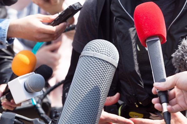 international relations professional at press conference